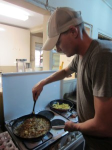 Jay cooking breakfast