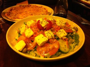 The had delicious salad & pizza, and good table wine