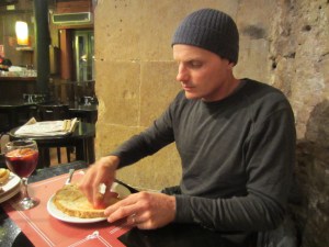 Spreading fresh tomato and garlic on the bread