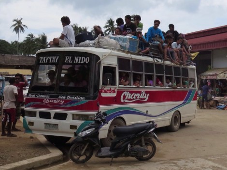 at the bus station...it was typical to see buses overloaded beyond capacity