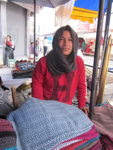 this scarf in the gray/blue color (on top of the pile)